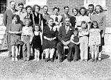 Edmund and Elva Dooley's 40th wedding anniversary,  circa 1946.  Front, l-r: Shirley Escher, Roger Dooley, Kay Cairns, Elva, Edmund, Richard Dooley, William Escher and Karen Dooley.  Rear, l-r: Ralph Cairns, Clark Dooley, Jr., Helen Cairns, Gail Cairns, Fritz Escher, Genevieve Escher, Clark Dooley, Dorothy Dooley, Peggy Dooley, Barney Dooley, Marjory Dooley.